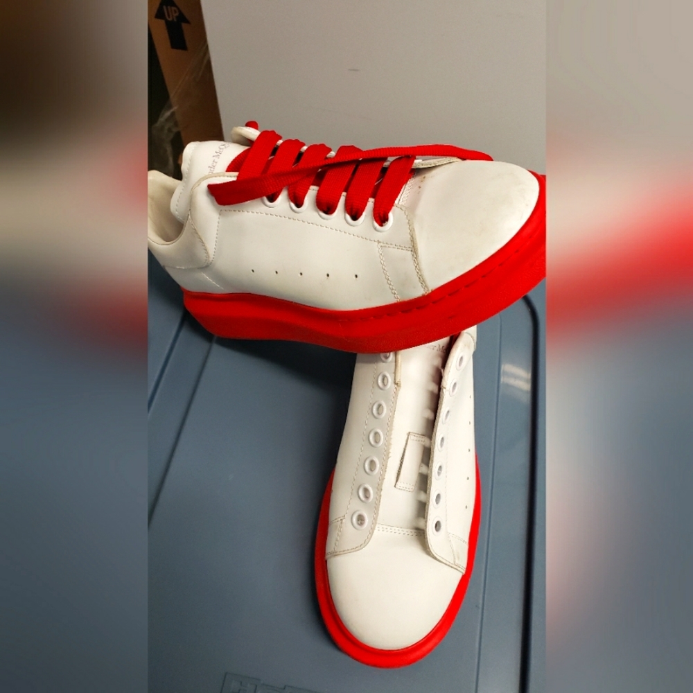 Alexander McQueen red bottom sneakers
